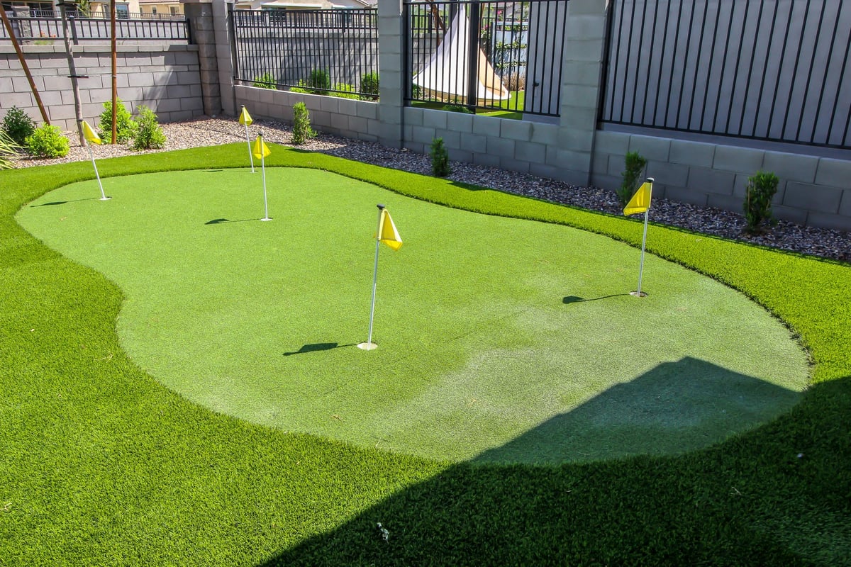 Rear yard putting green with five holes